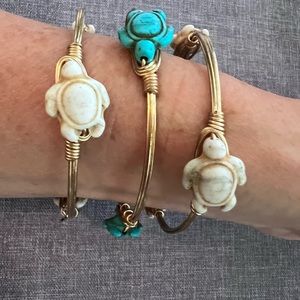 Gold Toned Bangels With Three Stone Turtles- two ivory and one turquoise.